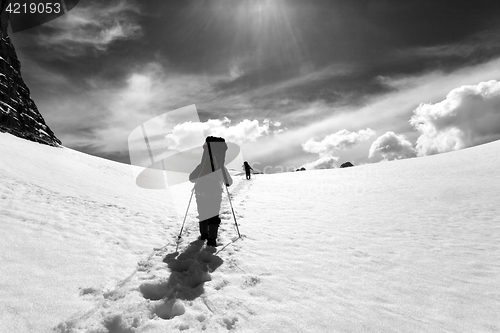 Image of Two hikers on snow plateau