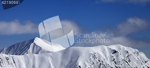 Image of Panoramic view on mountains with trace of avalanche