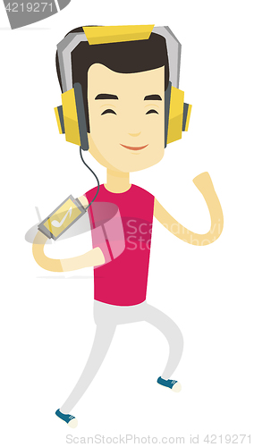 Image of Man running with earphones and smartphone.