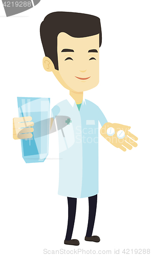 Image of Pharmacist giving pills and glass of water.