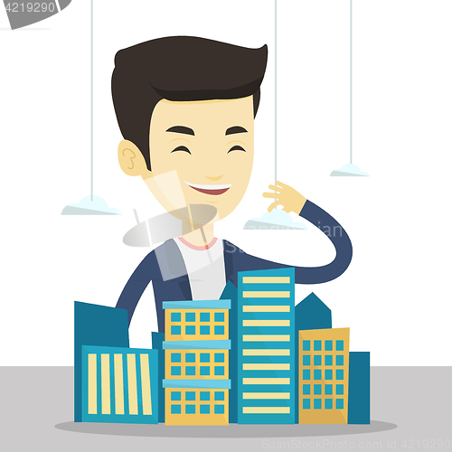 Image of Real estate agent presenting city model.