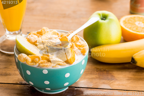 Image of Healthy home made breakfast of muesli, apples, fresh fruits and walnuts