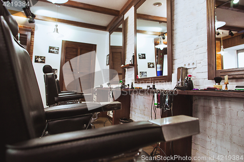 Image of Vintage chairs in barbershop