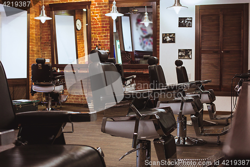 Image of Vintage chairs in barbershop