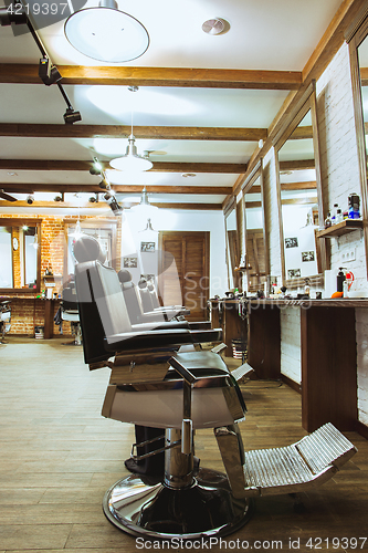 Image of Vintage chairs in barbershop