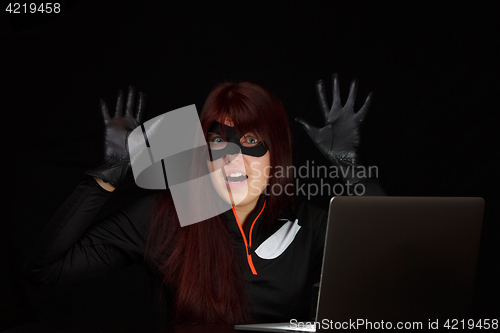 Image of Woman spy with raised hands