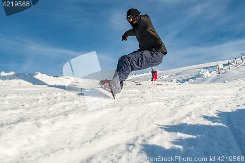 Image of Snowboard freerider in the mountains