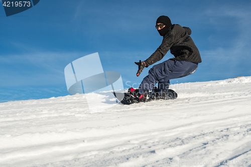 Image of Snowboard freerider in the mountains