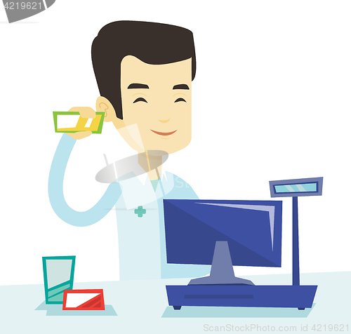 Image of Pharmacist showing some medicine.