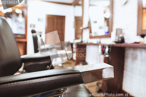 Image of Vintage chairs in barbershop