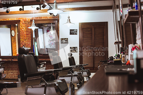 Image of Vintage chairs in barbershop