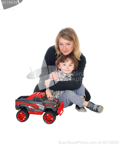 Image of Mother hugging her little boy.   