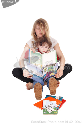 Image of Mother and little boy reading.
