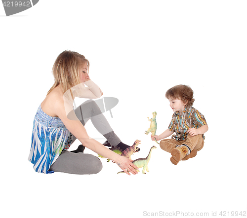 Image of Mother plays with little boy.