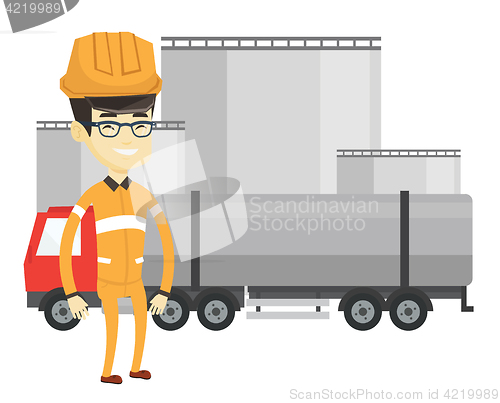 Image of Worker on background of fuel truck and oil plant.