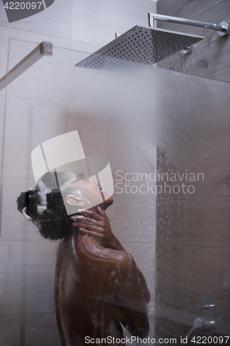 Image of African American woman in the shower