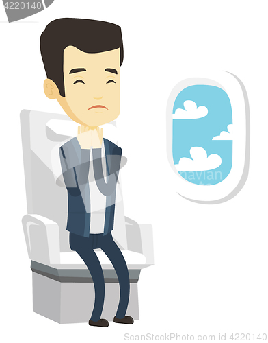 Image of Young man suffering from fear of flying.