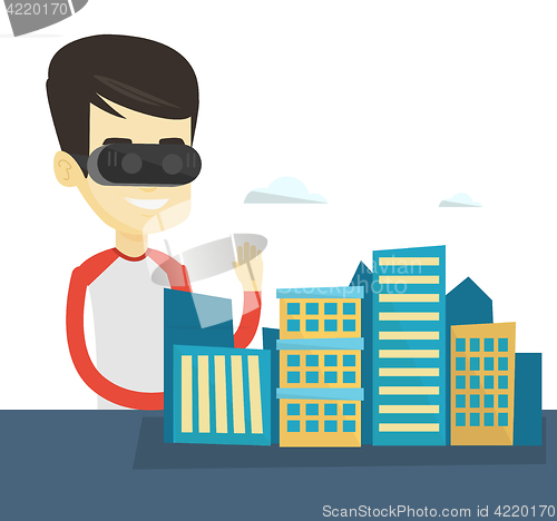 Image of Happy young man wearing virtual reality headset.