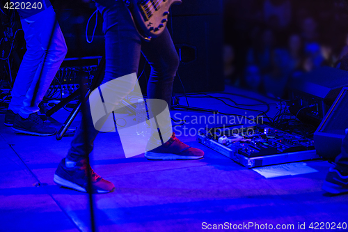 Image of The blur silhouette of rock musician at abstract rock concert