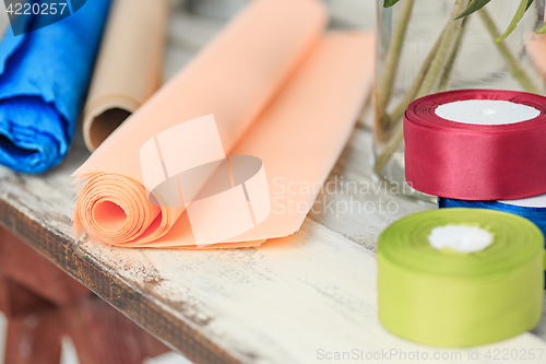 Image of The florist desktop with working tools on white background