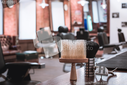 Image of Barber shop equipment on wooden background.