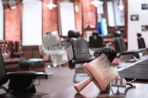 Image of Barber shop equipment on wooden background.