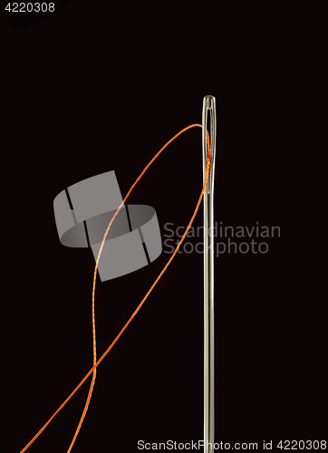 Image of Needle with thread