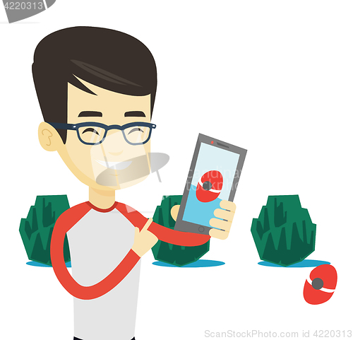 Image of Man playing action game on smartphone.