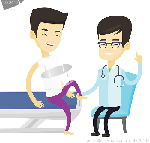 Image of Gym doctor checking ankle of a patient.