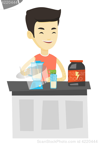 Image of Young man making protein cocktail.