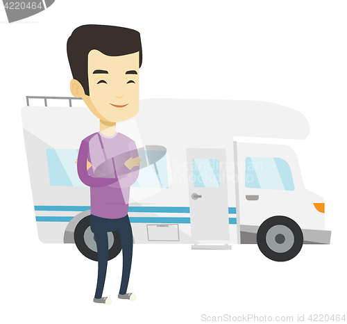 Image of Man standing in front of motor home.