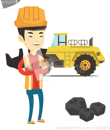 Image of Miner with a big excavator on background.