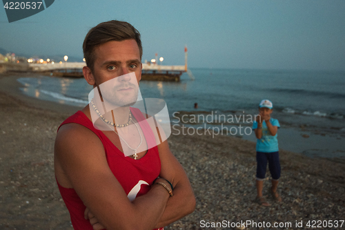 Image of man at the evening sea
