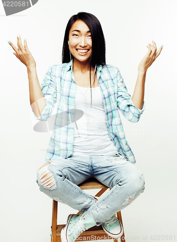 Image of young pretty asian woman posing cheerful emotional isolated on white background, lifestyle people concept 