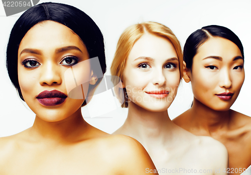 Image of three different nation woman: asian, african-american, caucasian together isolated on white background happy smiling, diverse type on skin, lifestyle people concept