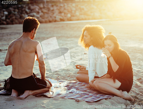 Image of pretty diverse nation and age friends on sea coast having fun, lifestyle people concept on beach vacations close up