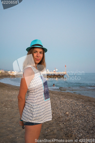 Image of beautiful woman on the beach