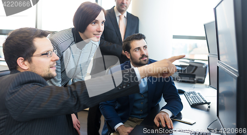 Image of Business team working in corporate office.