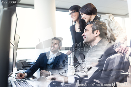 Image of Business team working in corporate office.