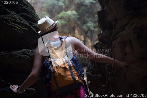 Image of Brunette among hills in rainforest