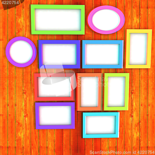 Image of Mock up picture frames on wood wall. 3d illustration. Anaglyph. 