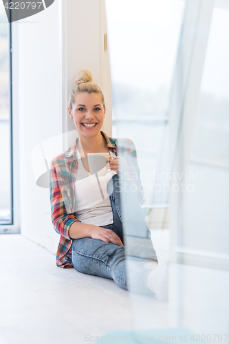 Image of Portrait of a beautiful girl on the floor