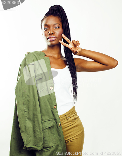 Image of young pretty african-american girl posing cheerful emotional on white background isolated, lifestyle people concept