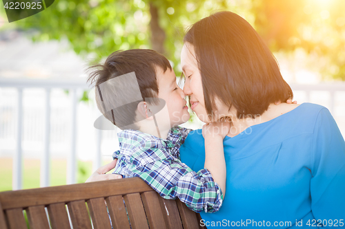 Image of Outdoor Portrait of Chinese Mother with Her Mixed Race Chinese a