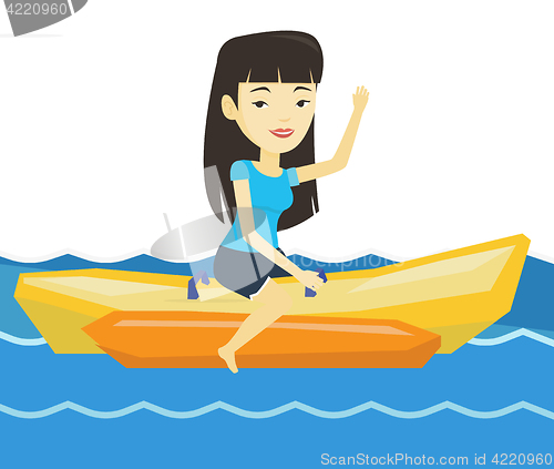 Image of Tourists riding a banana boat vector illustration.