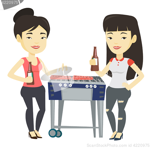 Image of Asian friends having fun at barbecue party.