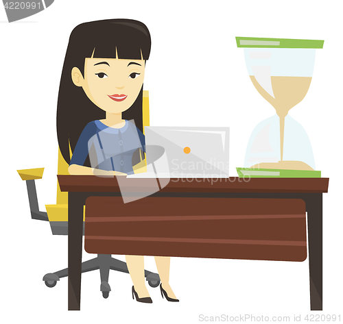 Image of Asian business woman working in office.