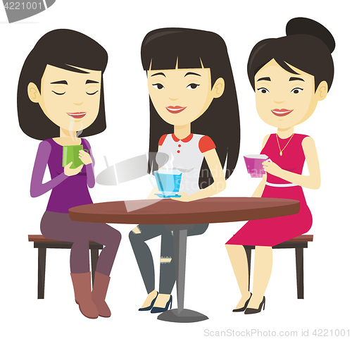 Image of Group of women drinking hot and alcoholic drinks.