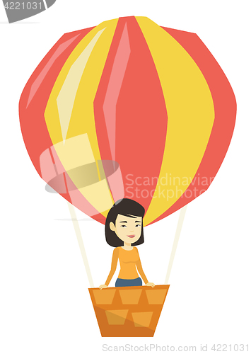 Image of Asian woman flying in hot air balloon.