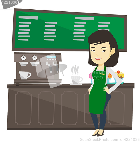 Image of Barista standing near coffee machine.